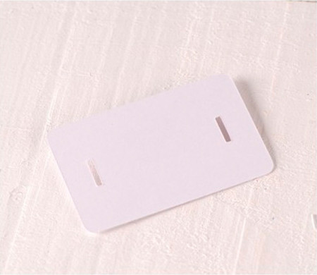 Cardboard clasp tags