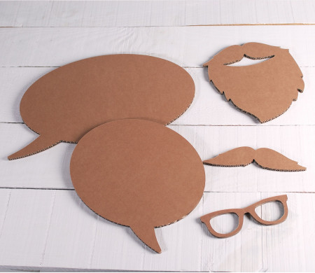 Cardboard photo booth with accessories