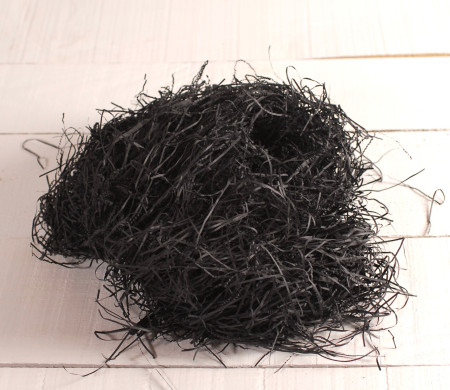 Paper shavings for cardboard boxes