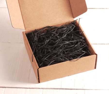 Paper shavings for cardboard boxes