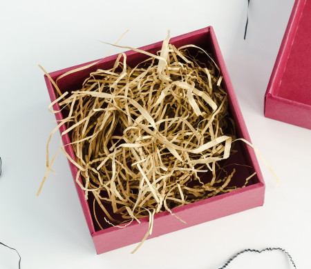 Paper shavings for cardboard boxes