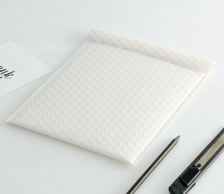 Gloss-finish delivery envelopes.