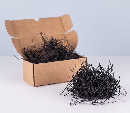 Paper shavings for cardboard boxes