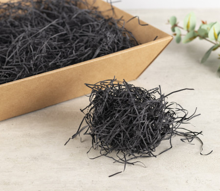 Paper shavings for cardboard boxes