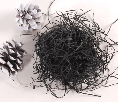 Paper shavings for cardboard boxes