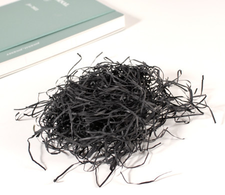 Paper shavings for cardboard boxes