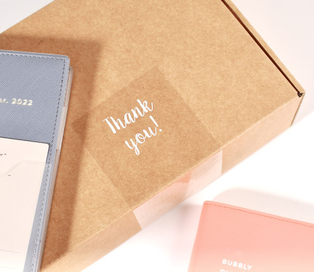 Transparent "Thank you" label for deliveries.