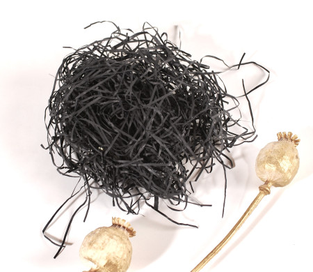 Paper shavings for cardboard boxes