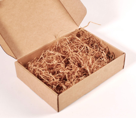 Paper shavings for cardboard boxes