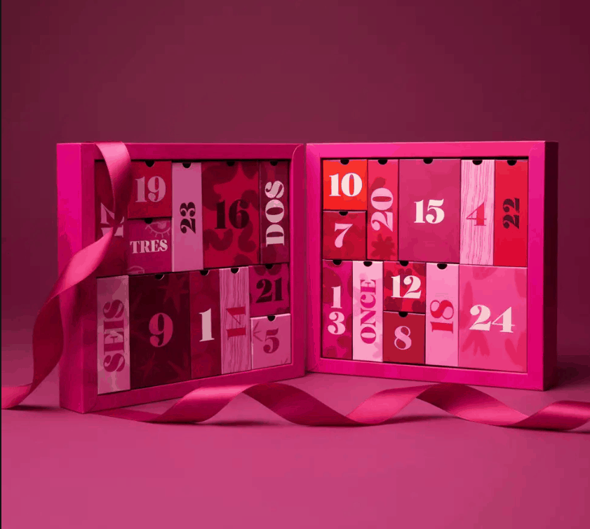 Custom-designed Advent calendar for Perfume's Club with multiple compartments for beauty products, manufactured by Selfpackaging.